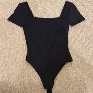 Babaton Sleek Black Kids Bodysuit